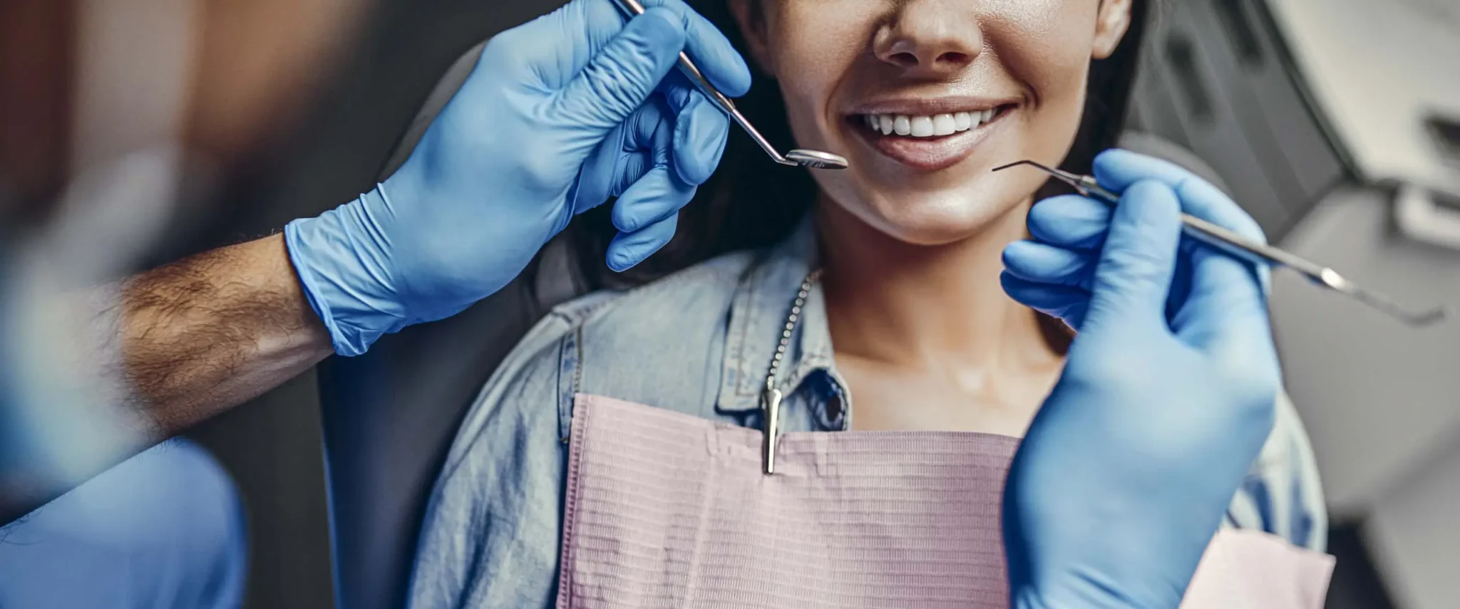 woman smiling on dentist chair